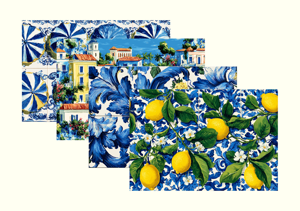 Four coordinated Tavola placemat designs fanned out — a preview of what a mystery drop can contain