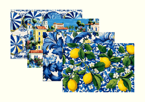 Four coordinated Tavola placemat designs fanned out — a preview of what a mystery drop can contain